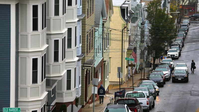 a row of crowded houses on a Boston street